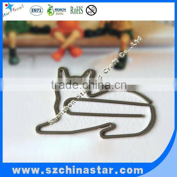 Metal penguin shaped paper clip as school supplies