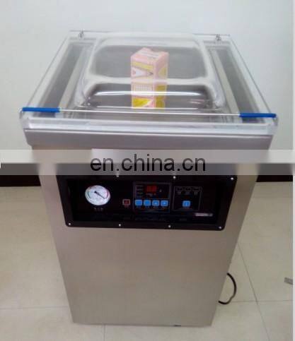 Automatic plastic bag rice vacuum packaging machine/food vacuum packaging machine
