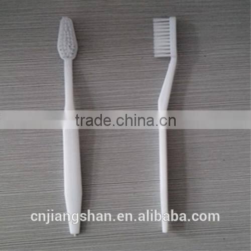 small plastic toothbrush one time use