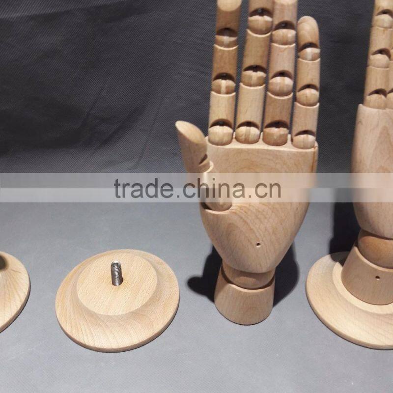 25cm height female left wooden hand beech wood with round wooden base an articulated hand