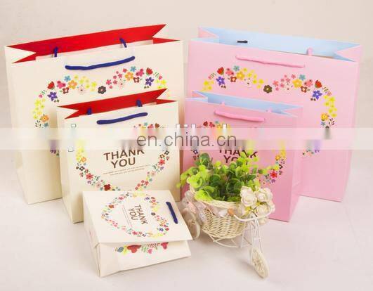 2015 cost production cookies packing paper bag with hanlde for shopping