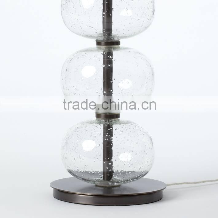 0627-11 Strung together like beads on a necklace, the Abacus Glass act Clear Table Lamp