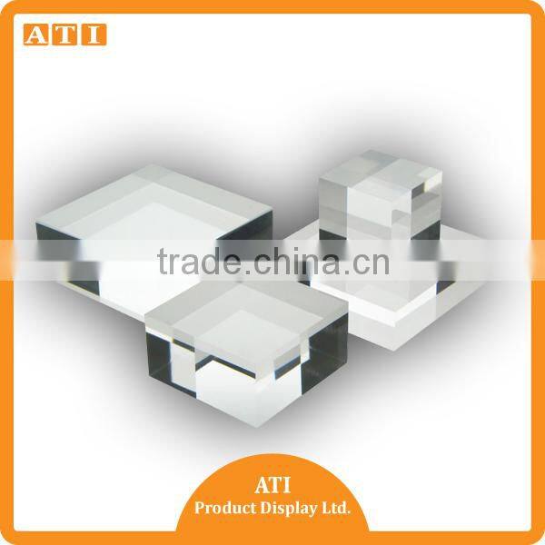 Hongkong supplier 3 steps clear round acrylic makeup products display riser