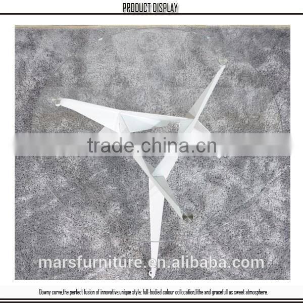 round glass table with metal legs