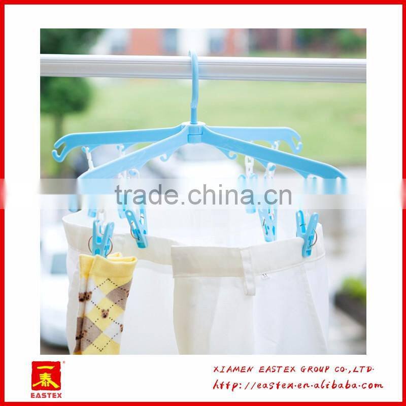 Rotatable clothes hanger rack with 8 clips