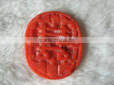wholesale 30-40mm oval light red chinese alphabet carved natural coral pendant