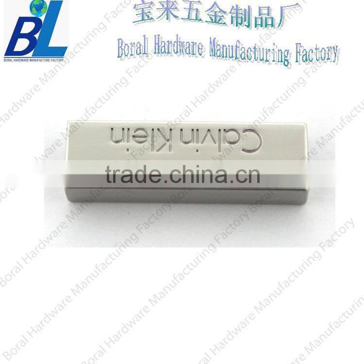 Custom metal corner for handbag straps