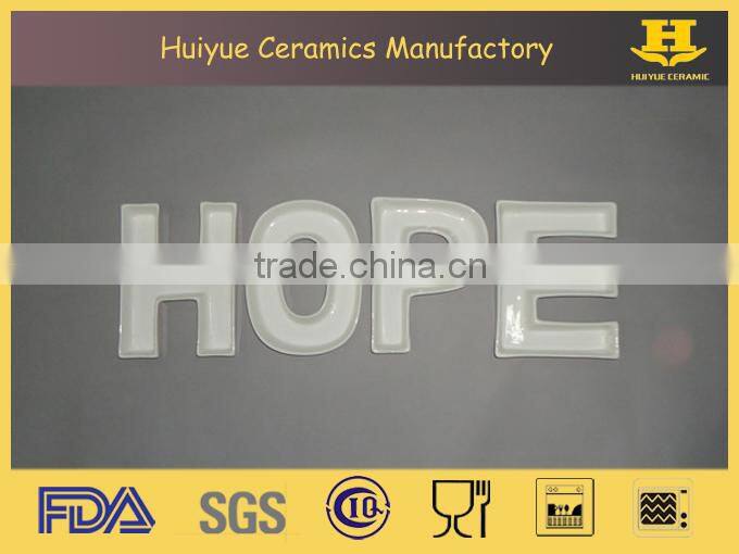 Ceramic dish in letter shape, ceramic letter