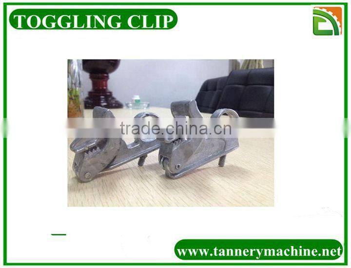 spring loaded toggle clips