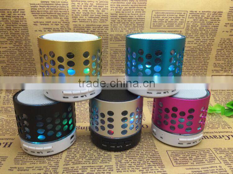 Round hole wireless Small mobile phone bluetooth speakers subwoofer TF card speaker hands-free speaker with LED FM