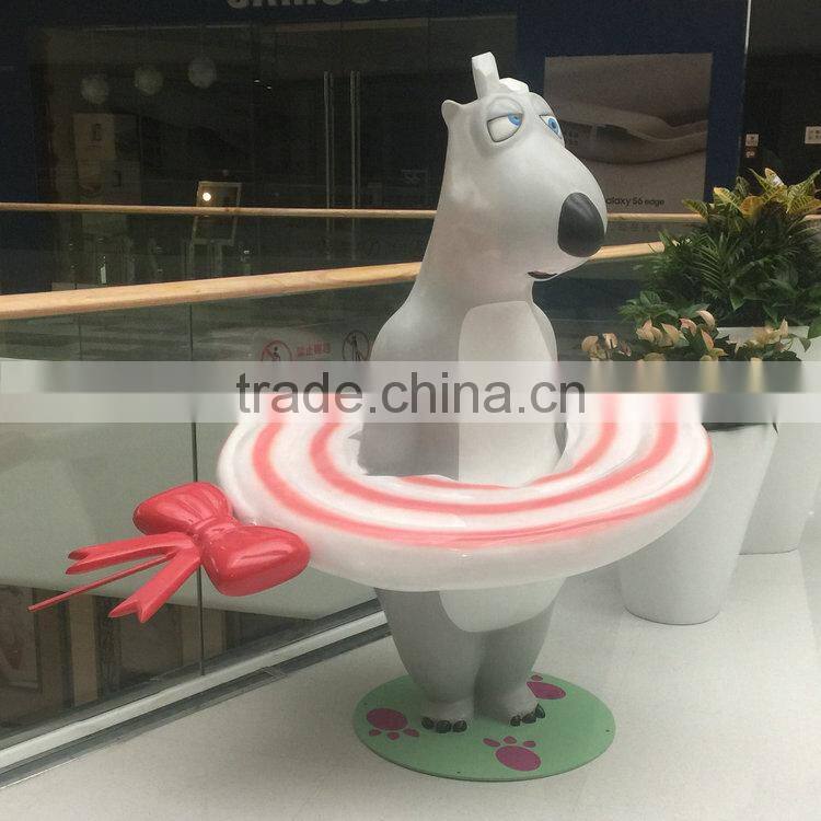 Fiberglass bear statue with lollipop