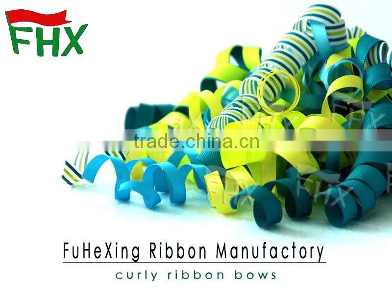 cushions embroidered with curly ribbon