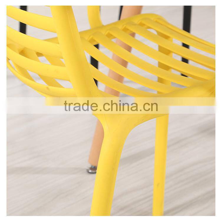 Used plastic armrest dining chairs