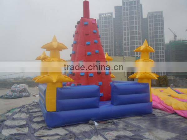 EN14960 certified commercial inflatable climbing wall, red tower theme climbing wall