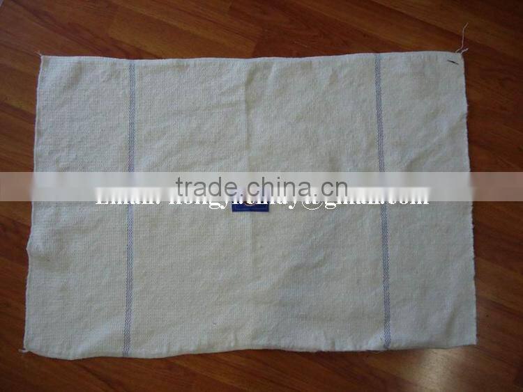 100%recycled cotton floor mop cloth with blue patch and hole in center