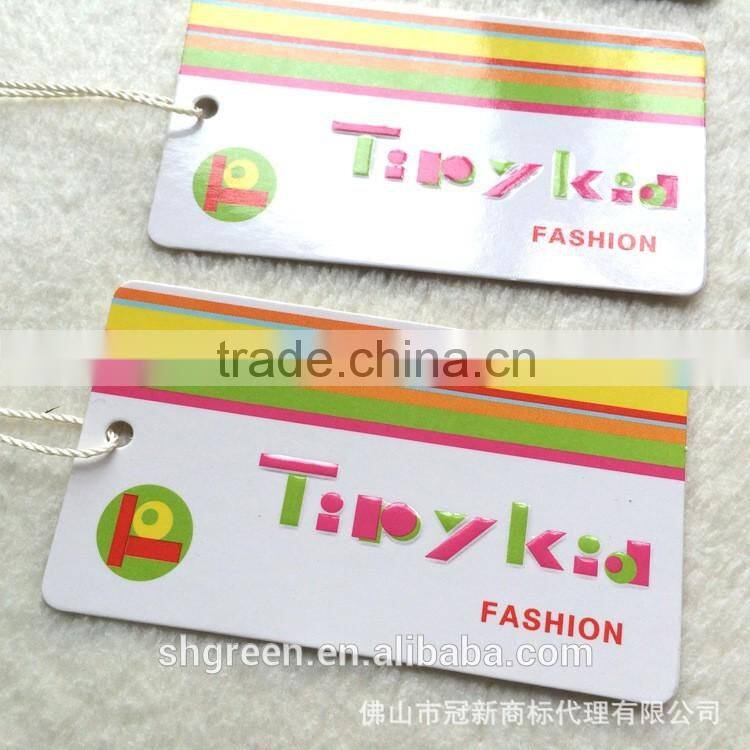 Vogue spot UV paper hangtag with nylon ribbon