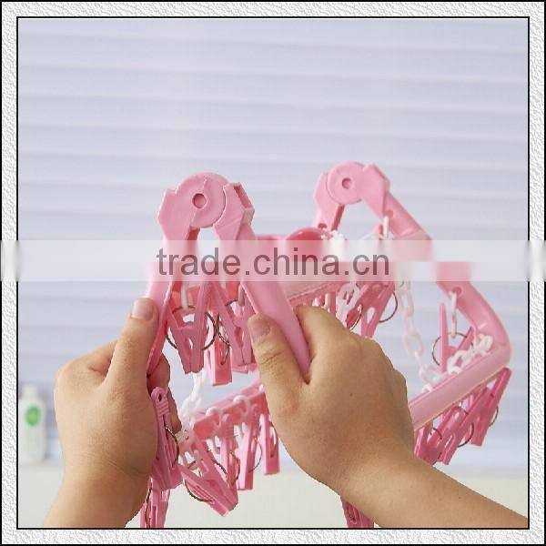 Cheap high quality foldable plastic hard hanger with lips for home cloth scoks bras in professional OEM maker