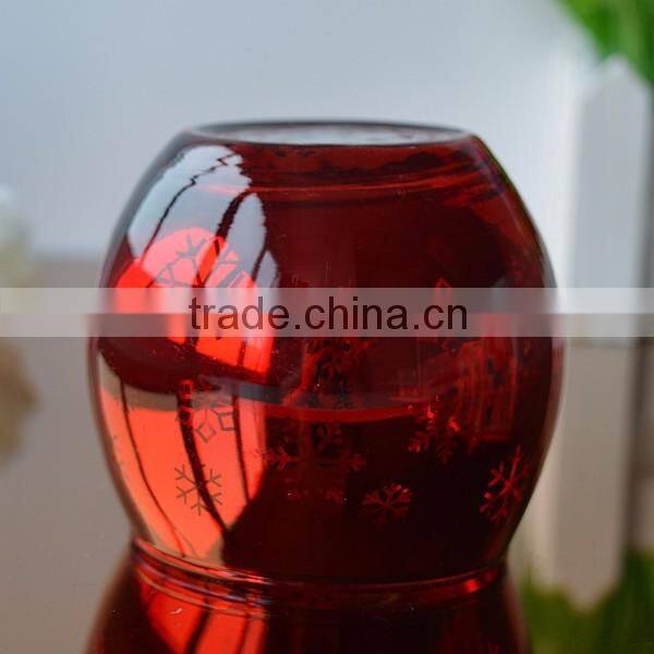 Stocked red glass candle holder for christmas