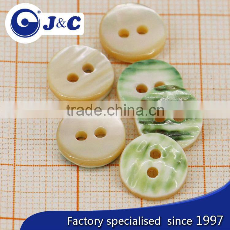 2015 Manufacture white color cat eye shell button
