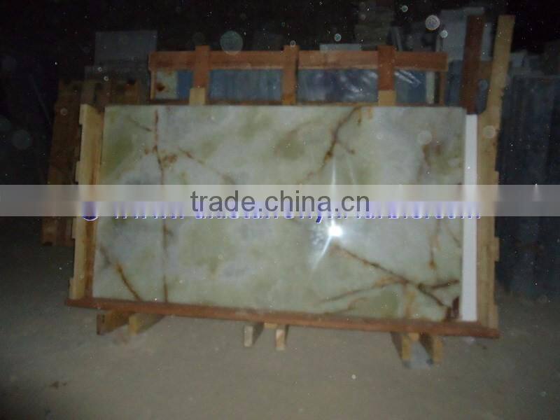 A GRADE LIGHT GREEN ONYX TABLE TOPS COLLECTION
