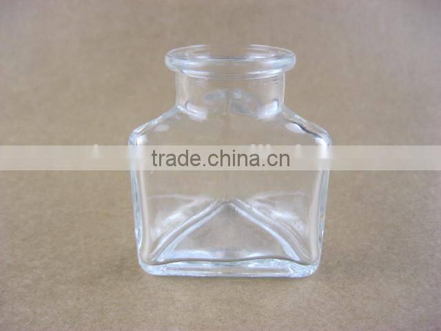triangle shaped glass storage jar