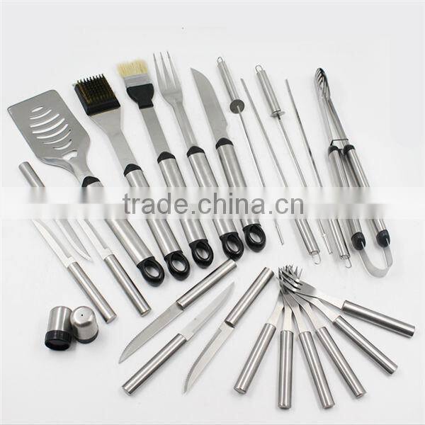 Different types of grill tools with bbq skewer