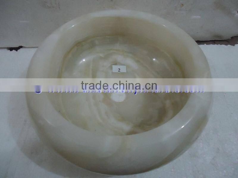 The most beautiful& best quality PURE WHITE ONYX ROUND TYRE SHAPED SINKS AND BASINS