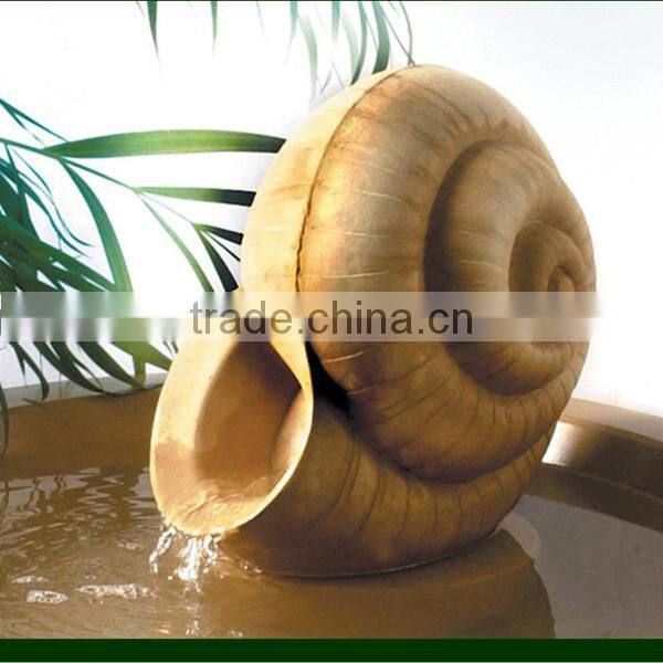 Yellow stone nautilus fountain for garden