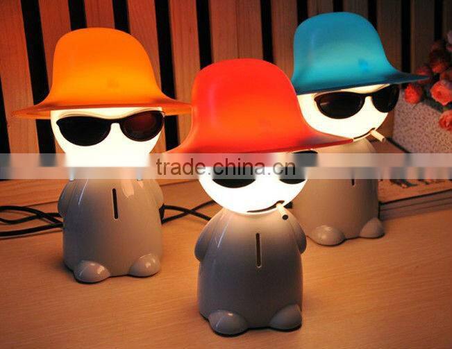 Supply creative Smoking boy lamp / night light + Piggy Bank