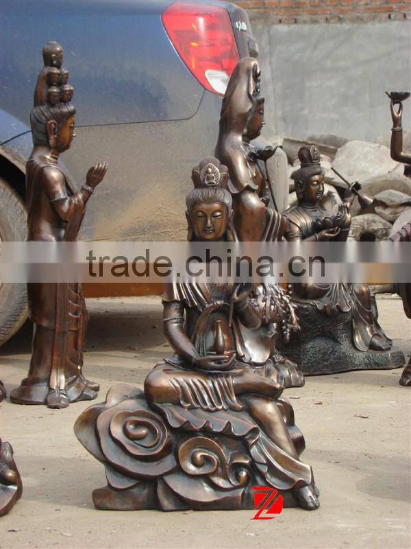 sitting bronze kuan yin statue with wicker