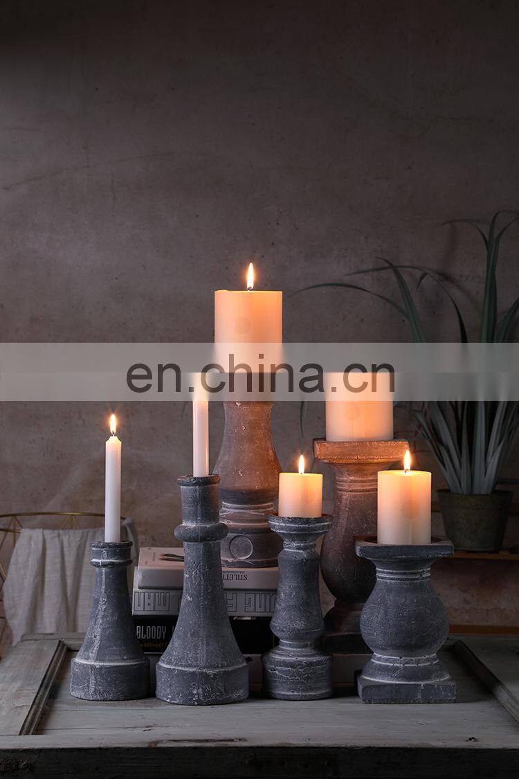 China wholesale vintage custom cement candlestick cheap home decor church pillar tall candle holder in bulk