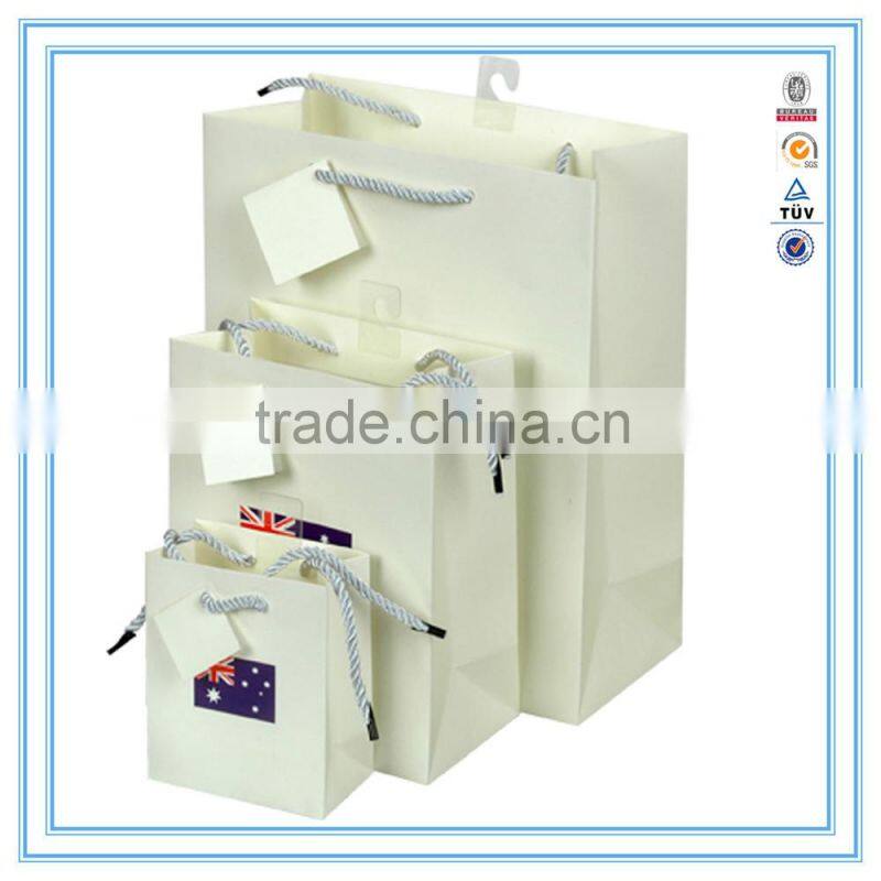 Alibaba china custom white luxury paper bag & brand paper bag printing logo with handles