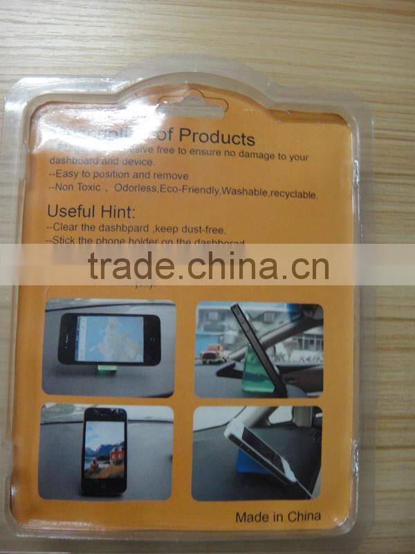 Universal dashboard cell phone holder