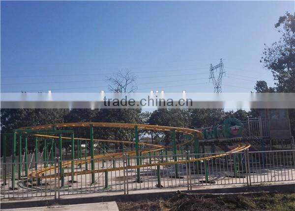 Kids large amusement rides mini roller coaster , sliding dragon / green worm mini roller coaster rides hot sale