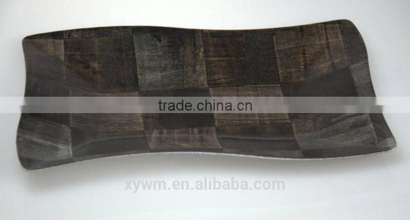Black woven wooden serving tray and plate
