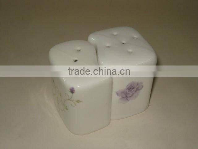 round ceramic salt & pepper shaker with metal stand