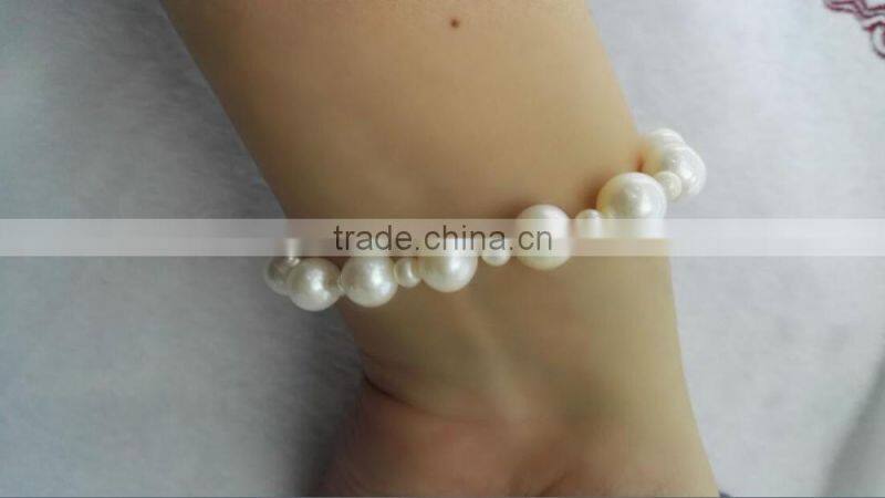 AA 8mm white with 2mm white round freshwater pearl bracelet