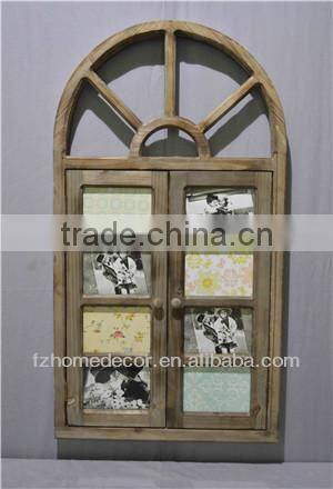 Decorative wooden panelled window with metal scrolls, distressed finish.
