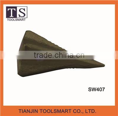 Gold painted stone splitting wedge