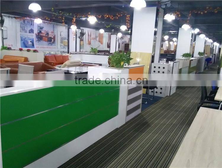 Black tufted reception desk made with tempered glass