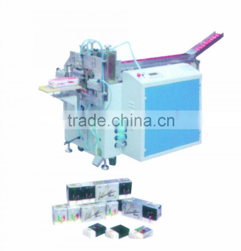 Paper napkin machine