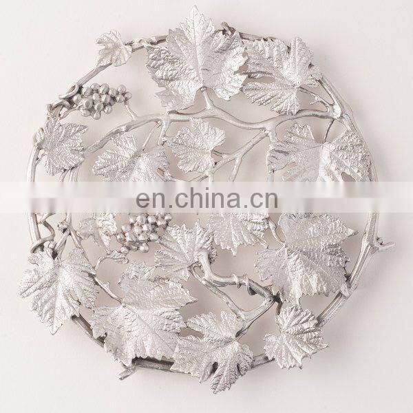 silver flower design trivet