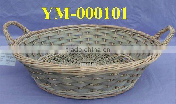 grey round wicker tray with two ears