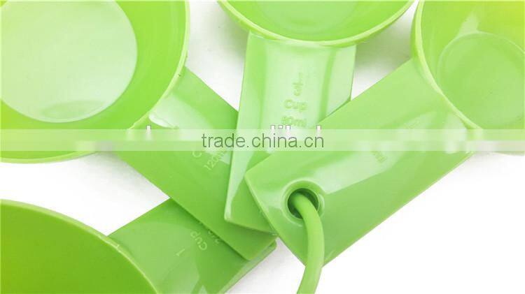 Small plastic measuring cups