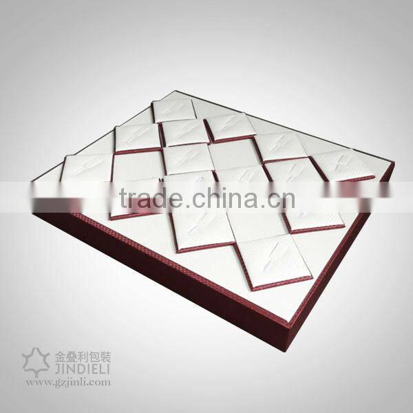 white leather cabochon suit display jewelry tray