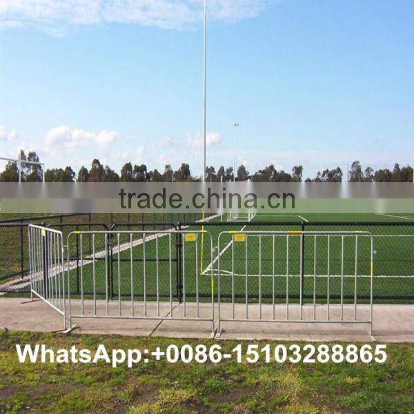 Out door orange painted crowd control for temp fence