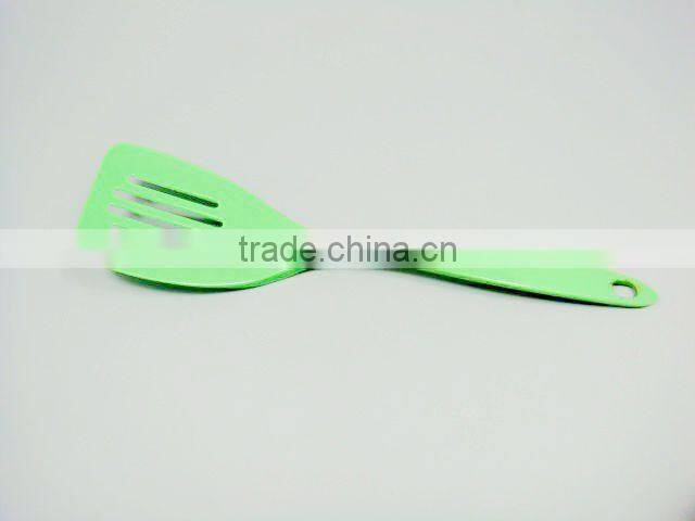 Yellow melamine spoon kitchenware cookware