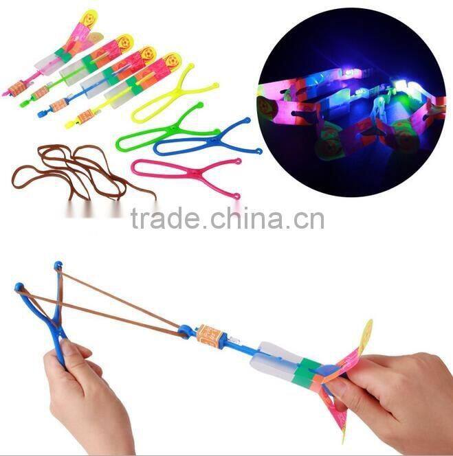 Kid Games Toy Elastic LED Flying Rotating Rocket Arrow Helicopter Kids