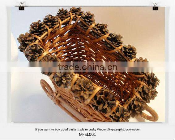 Chirstmas craft & wicker sled & wicker sleigh with pine cone decorate