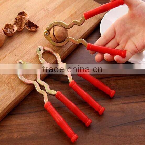 cheap plastic and iron nut cracker macadamia nut cracker walnut cracker